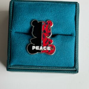 War Tears, Peace Repars Pin Rounded