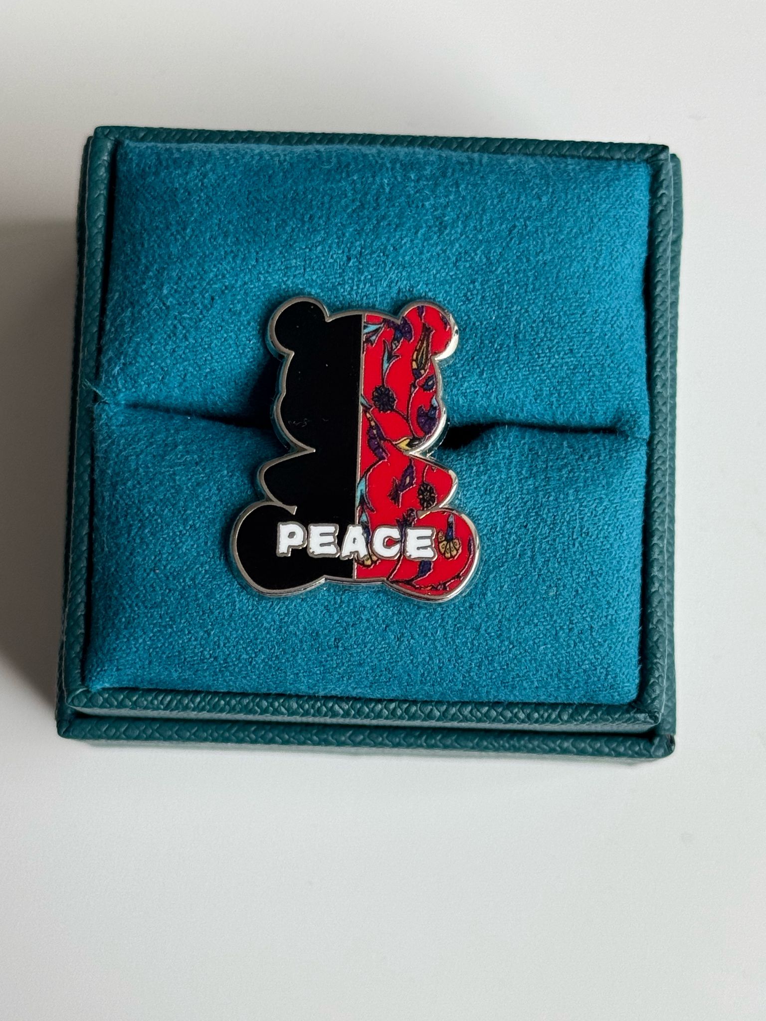 War Tears, Peace Repars Pin Rounded