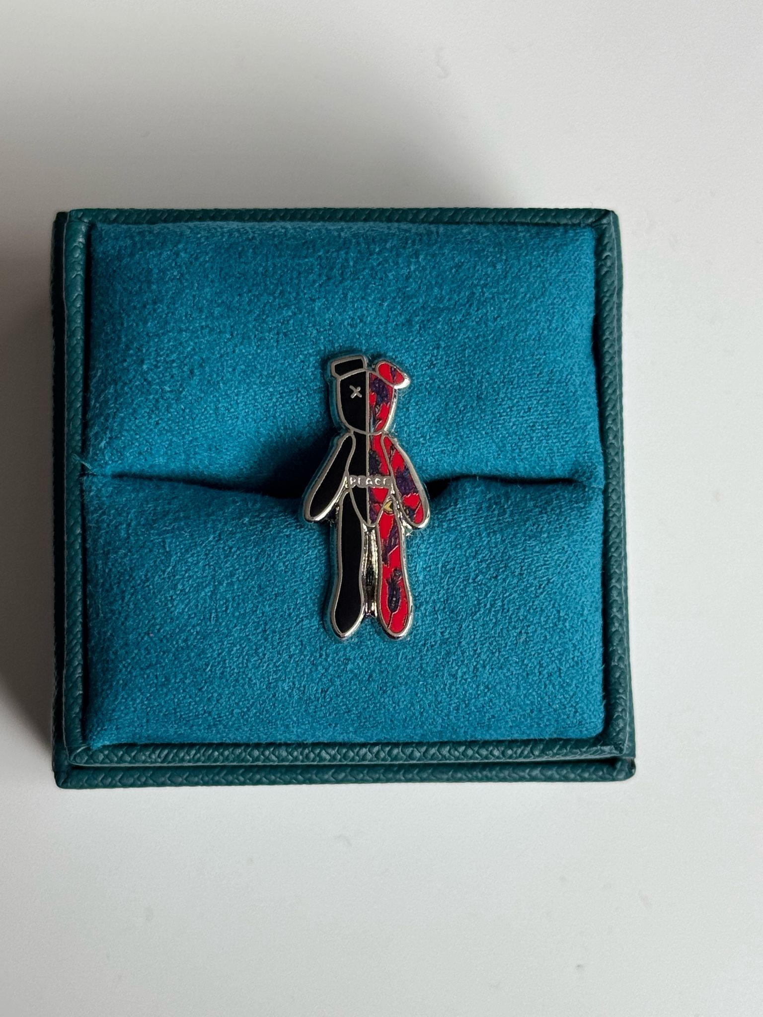 War Tears, Peace Repars Pin